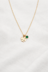 Elegant gold necklace with charms