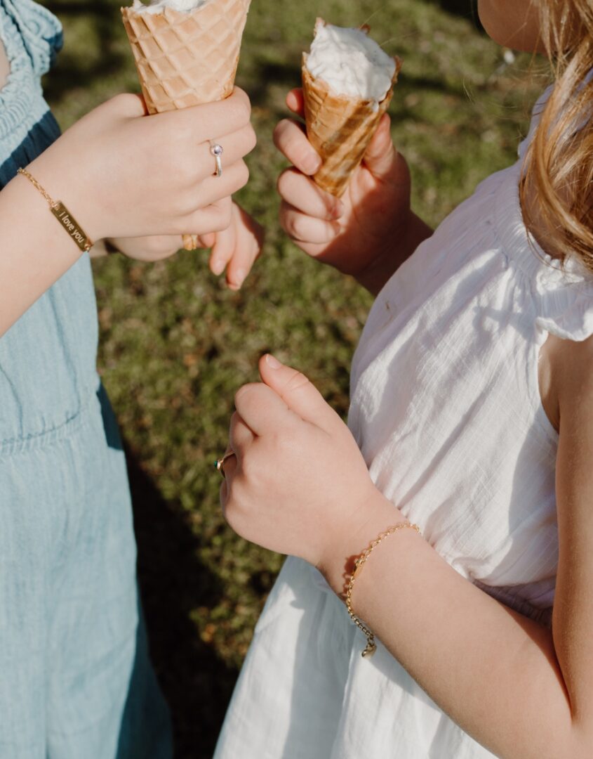 Little girls wearing Gold-Filled Rectangle Bracelet with 'I Love You' engraved