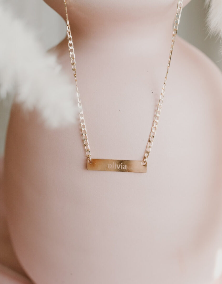 Flatlay image of Engraved Gold-Filled Name Bar Necklace