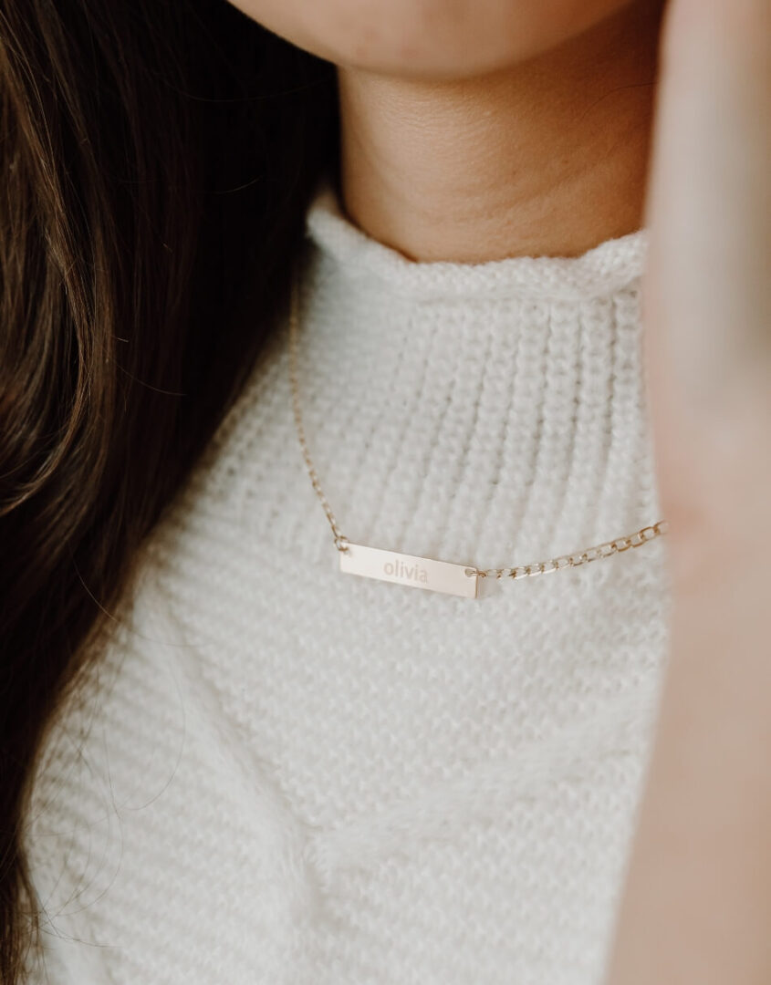 Image of model wearing Engraved Gold-Filled Name Bar Necklace