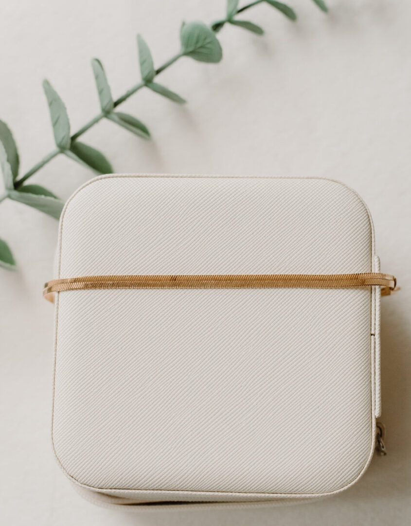 Flatlay image of Gold-Filled Herringbone Bracelet on jewelry case