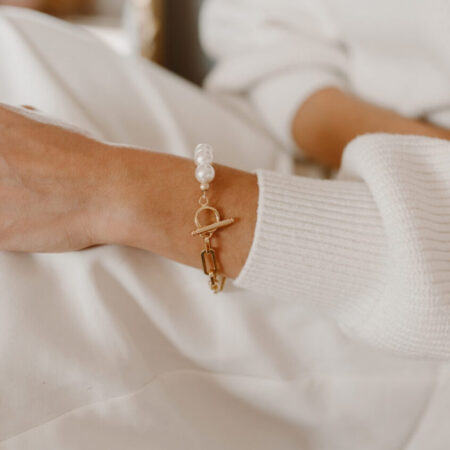 image of model wearing Oval Link Pearl Bracelet