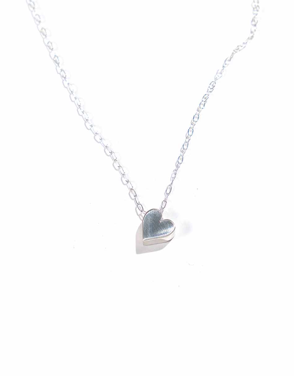 Sterling silver heart hung on a beautiful sterling silver dainty chain. Perfect way to show love to that special person