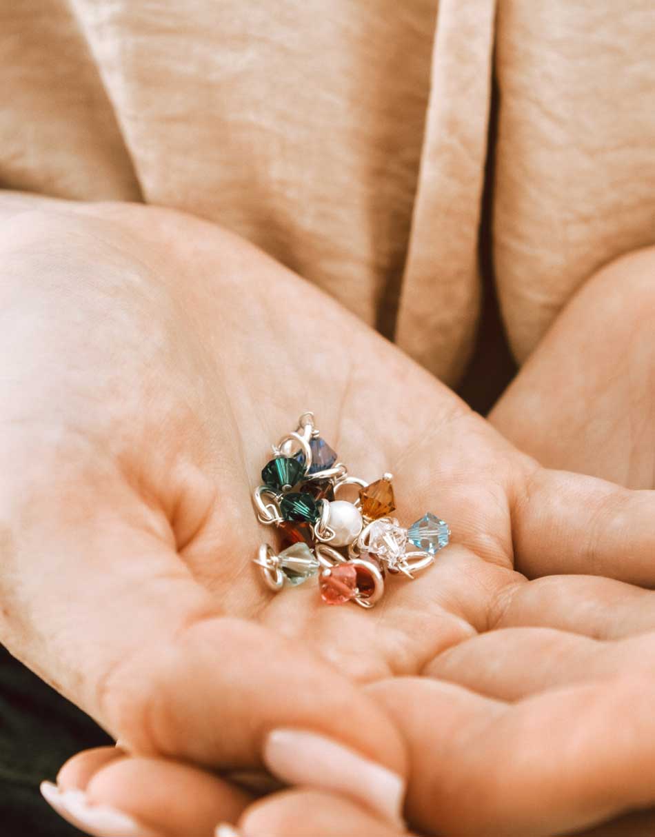Made from genuine swarovski crystals and sterling silver, these are made ready to slide right onto your chain!