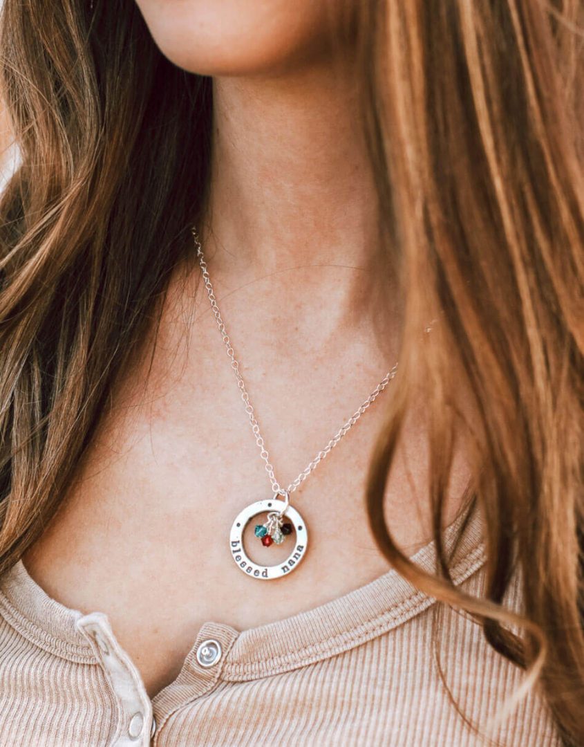 Handmade washers hand cast in fine pewter and stamped with “blessed nana” with swarovski birthstone for each grandchild