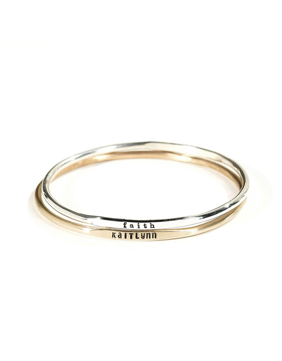 Personalized stackable bangles in sterling silver or gold-filled, hand stamped with name, date or message. Perfect jewelry for mom