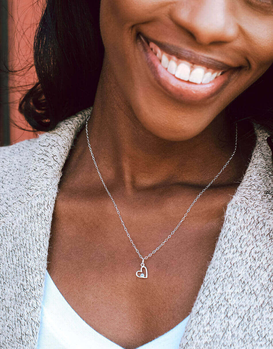 A pretty birthstone set inside each heart is the perfect touch to this dainty little heart. Perfect for wife, mom, sister