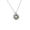A beautiful sterling silver disc with a sterling silver heart soldered on it. Hand-stamped with your choice of name. Best gift for mom, or wife