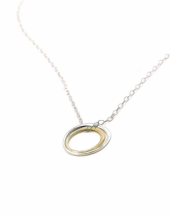 Made with a sterling silver circle and a gold filled circle, hung on a gorgeous sterling silver dainty chain. Best gift for soul sisters.