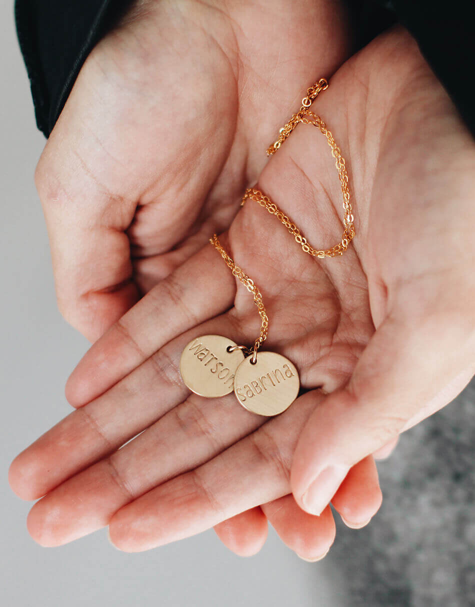 Gold-filled discs with hand-stamped with your custom names or words.