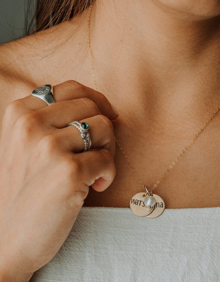 Personalized necklace for mom, wife, daughter. A gold-filled dainty disc with hand stamped names