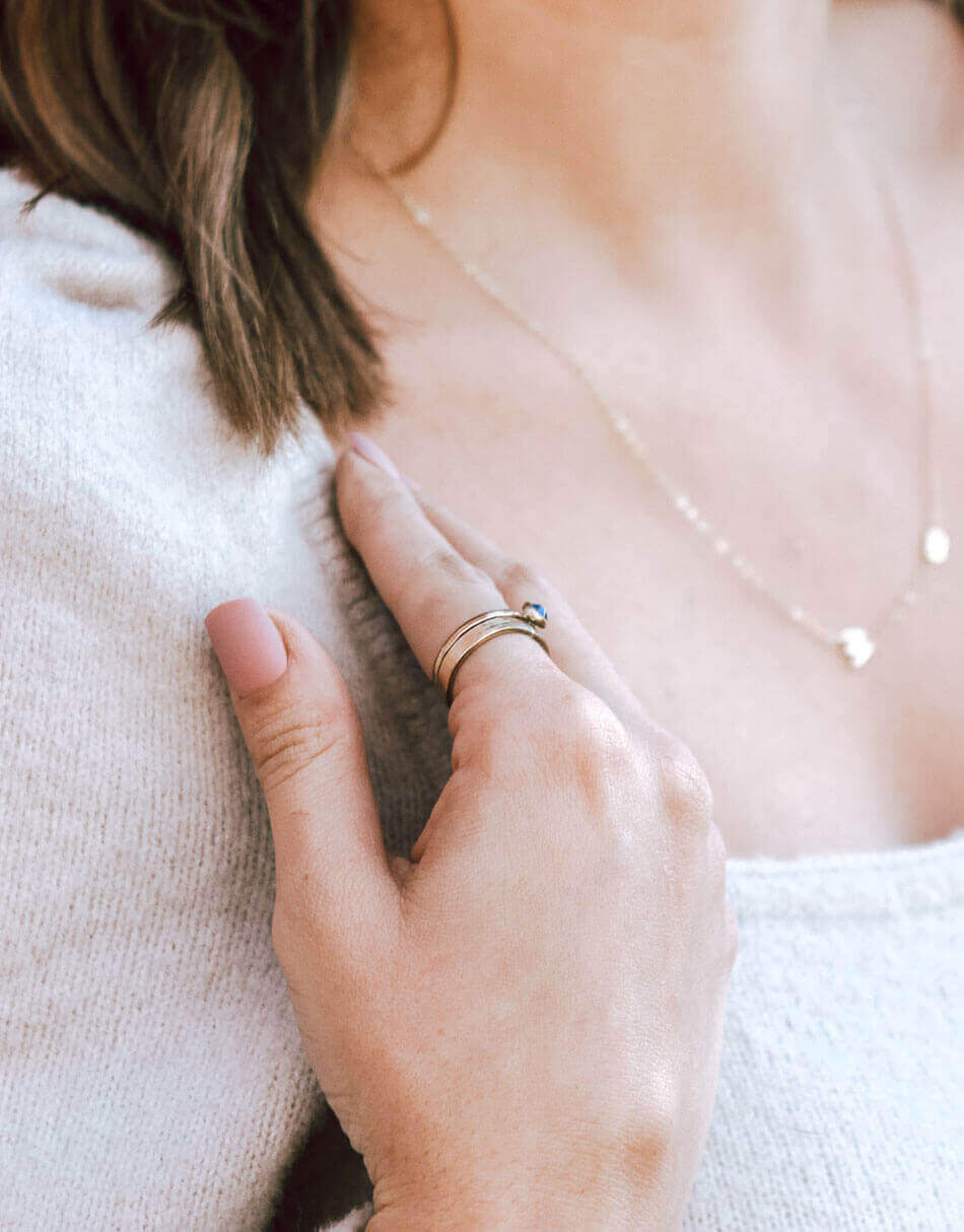 Gold filled stacking birthstone rings personalized for a name or date. Pair with a sweet simple band that adorns the stone of your choice.
