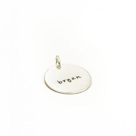 A large sterling silver circle charm with name engraved. Perfect gift for mom, grandma, friend, sister, daughter
