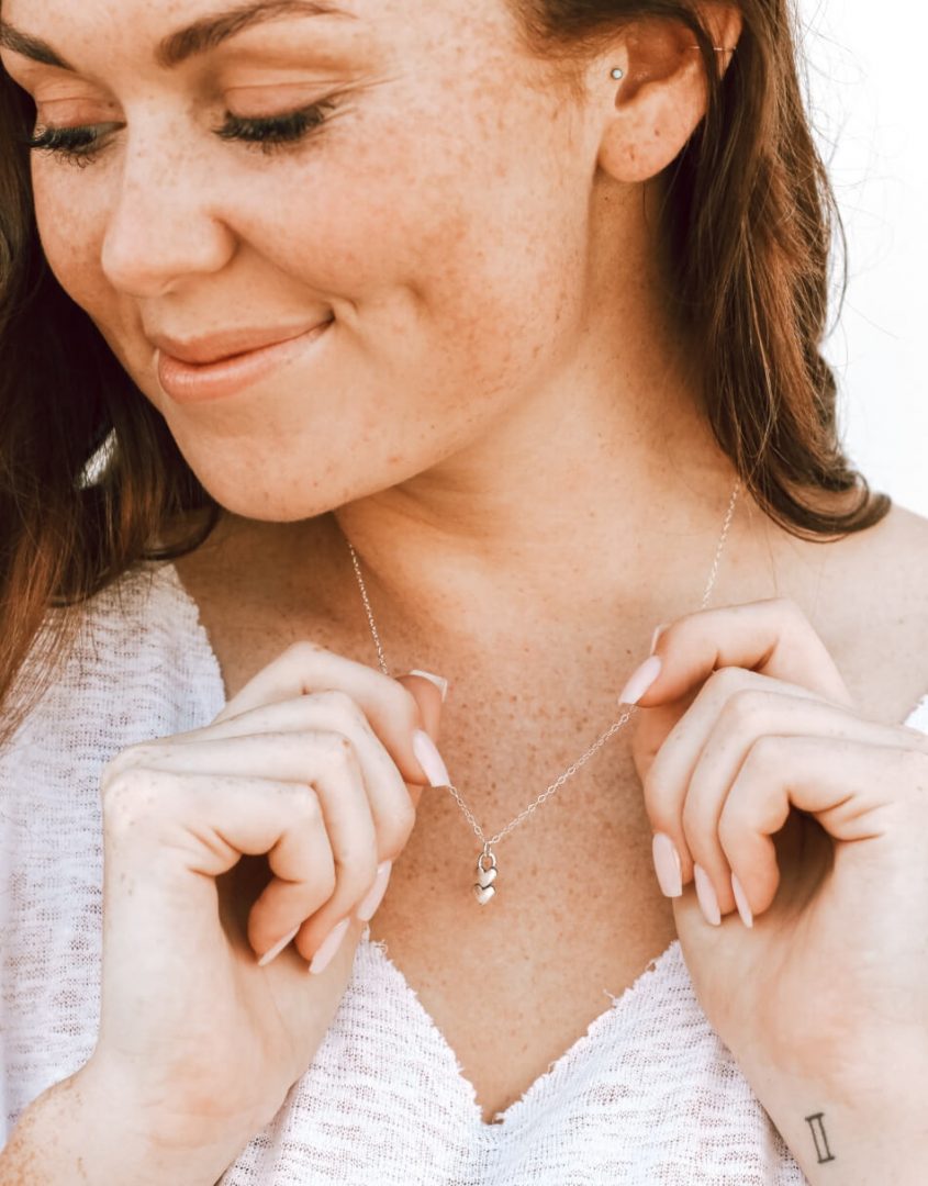 sterling silver heart necklace that can be personalized by adding more hearts. This necklace is best for mothers and grandmothers