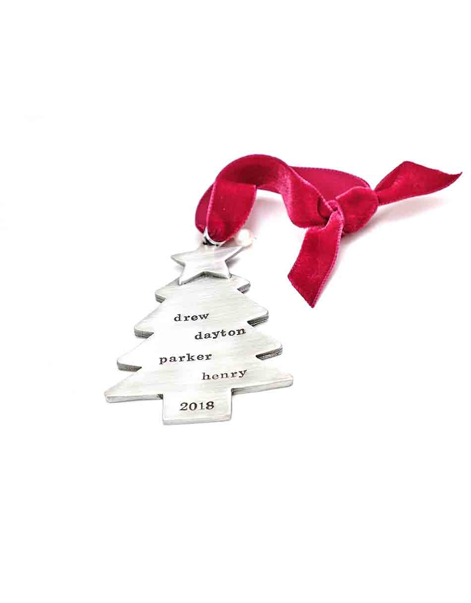 Handmade christmas tree adorned with a star on top and hand stamped with names of message. Perfect christmas gift for your family