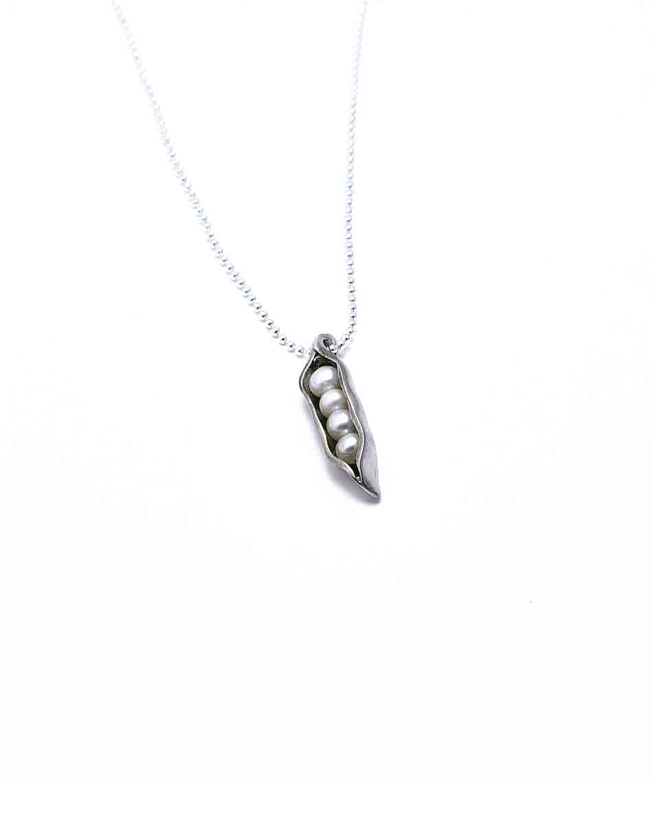 Hand sculpted pea pods hand-cast in fine pewter with a freshwater pearl inside, resembling your child. Best gift for a mom