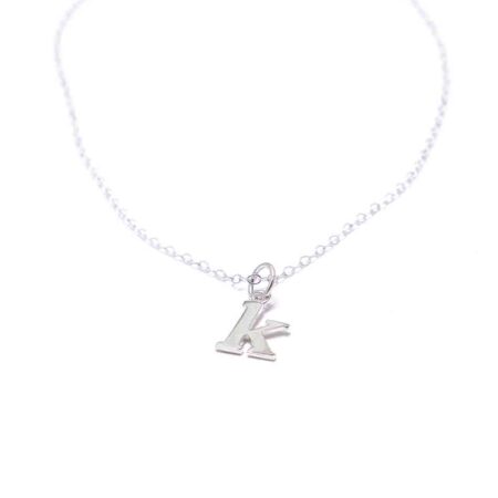 A dainty sterling silver necklace with lowercase typewriter initials. Perfect gift on family occasion or grandma, mom
