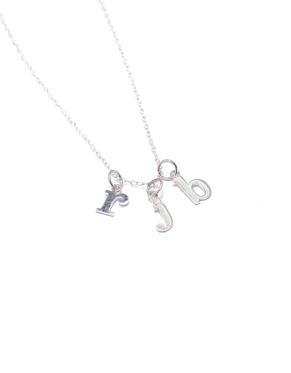 A dainty sterling silver necklace with lowercase typewriter initials. Perfect gift on family occasion or grandma, mom