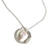 Sterling silver disc charm with mother of pearl in the middle. Personalize with names on it.