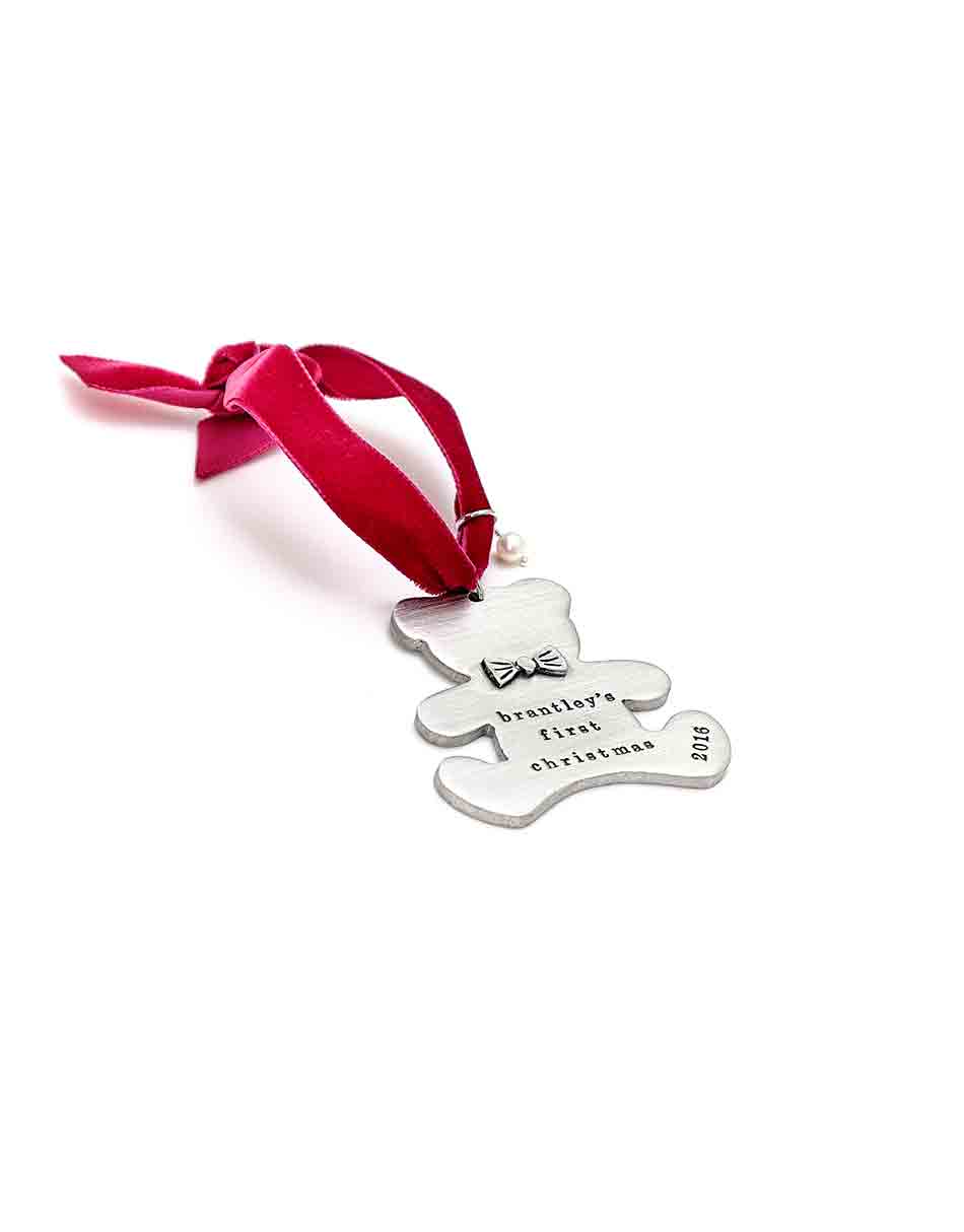 A teddy bear handcrafted and casted in fine pewter. Customize with your kid's name, birthdate, weight.
