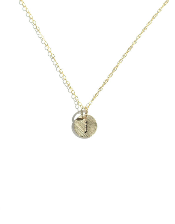 Hand-stamped initial on a tiny disc, in sterling silver or gold. Best personalized necklace for wife, mom, sister, friend